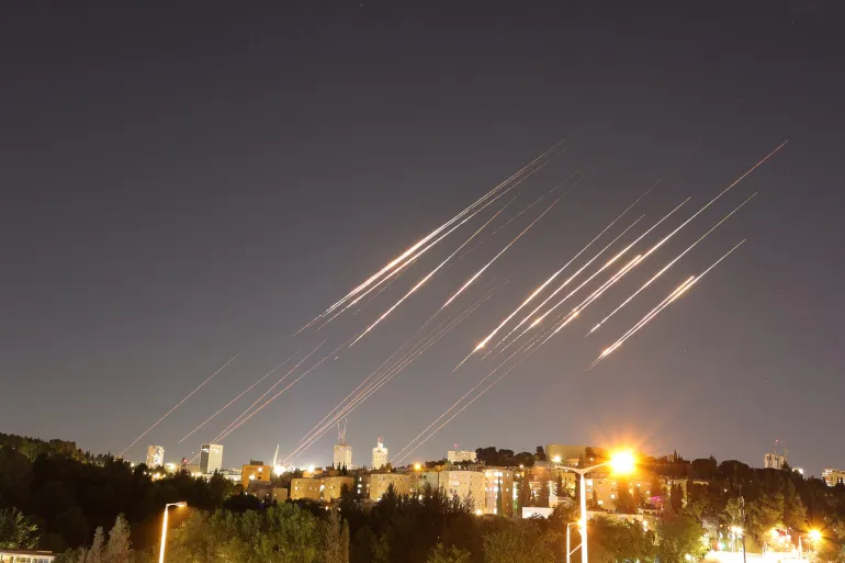 Tehran skyline with smoke rising after Israeli airstrikes during Israel-Iran conflict